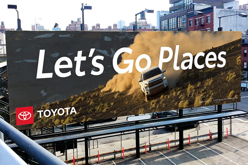 Billboard with Let's Go Places headline and brand logo