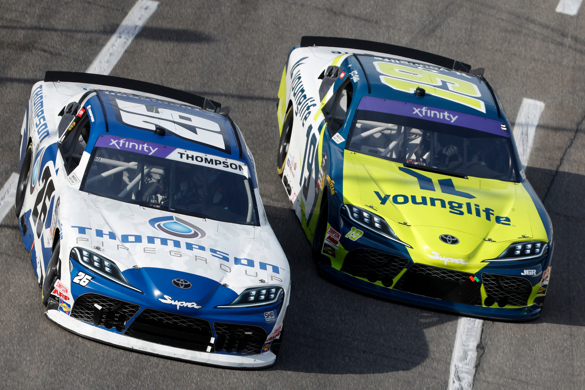 #26: Dean Thompson, Sam Hunt Racing, Thompson Pipe Group Toyota Supra, #19: Aric Almirola, Joe Gibbs Racing, Young Life Toyota Supra