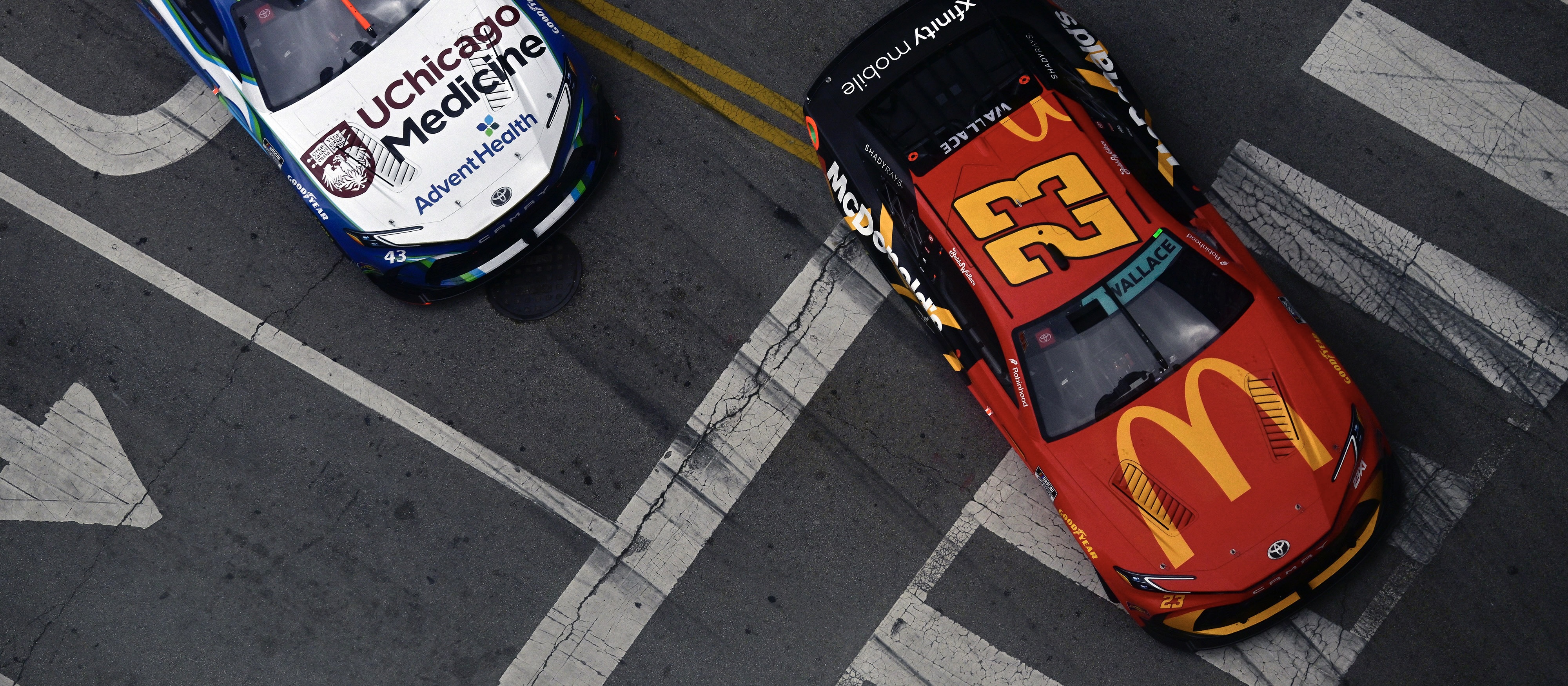 #23: Bubba Wallace, 23XI Racing, McDonald's Toyota Camry and #43: Erik Jones, LEGACY MOTOR CLUB, AdventHealth Toyota Camry