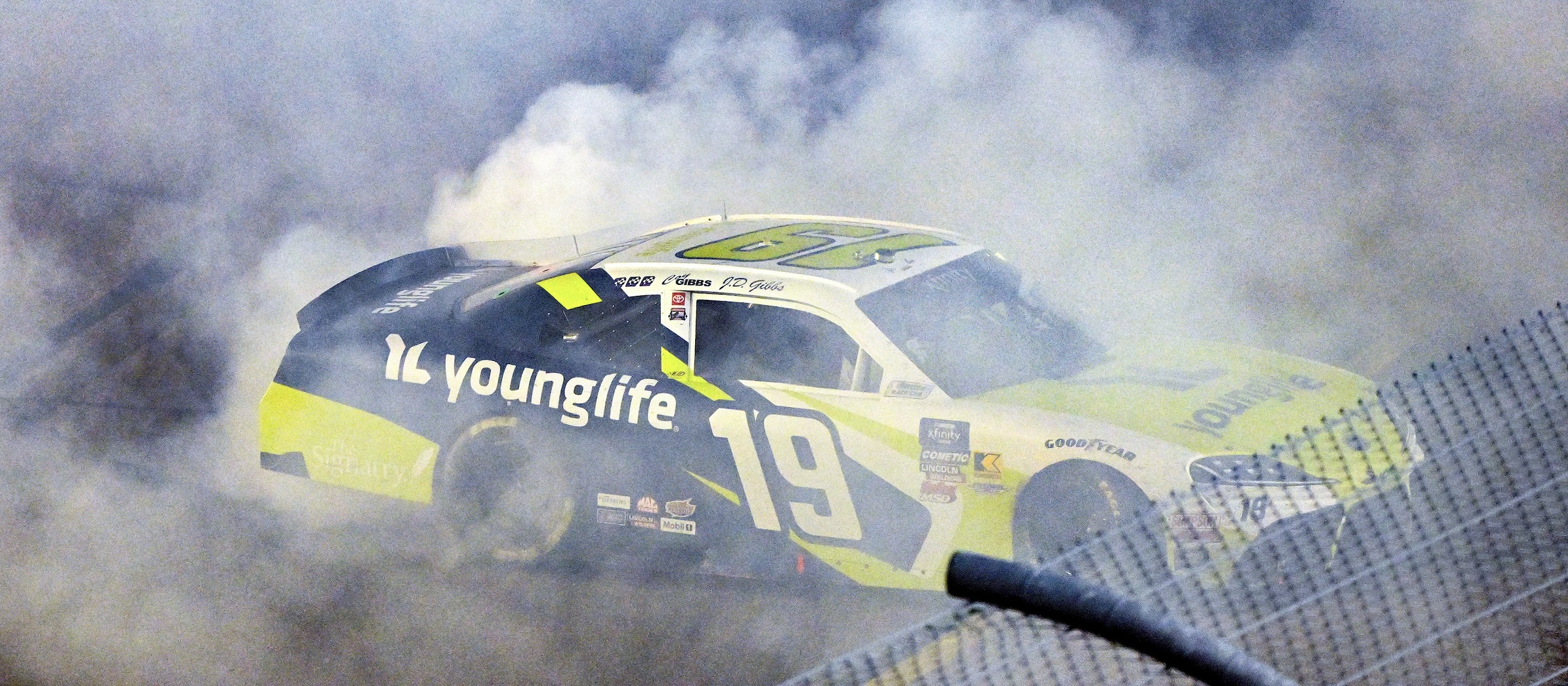 #19: Aric Almirola, Joe Gibbs Racing, Young Life Toyota Supra celebrates winning the Xfinity Owners Championship