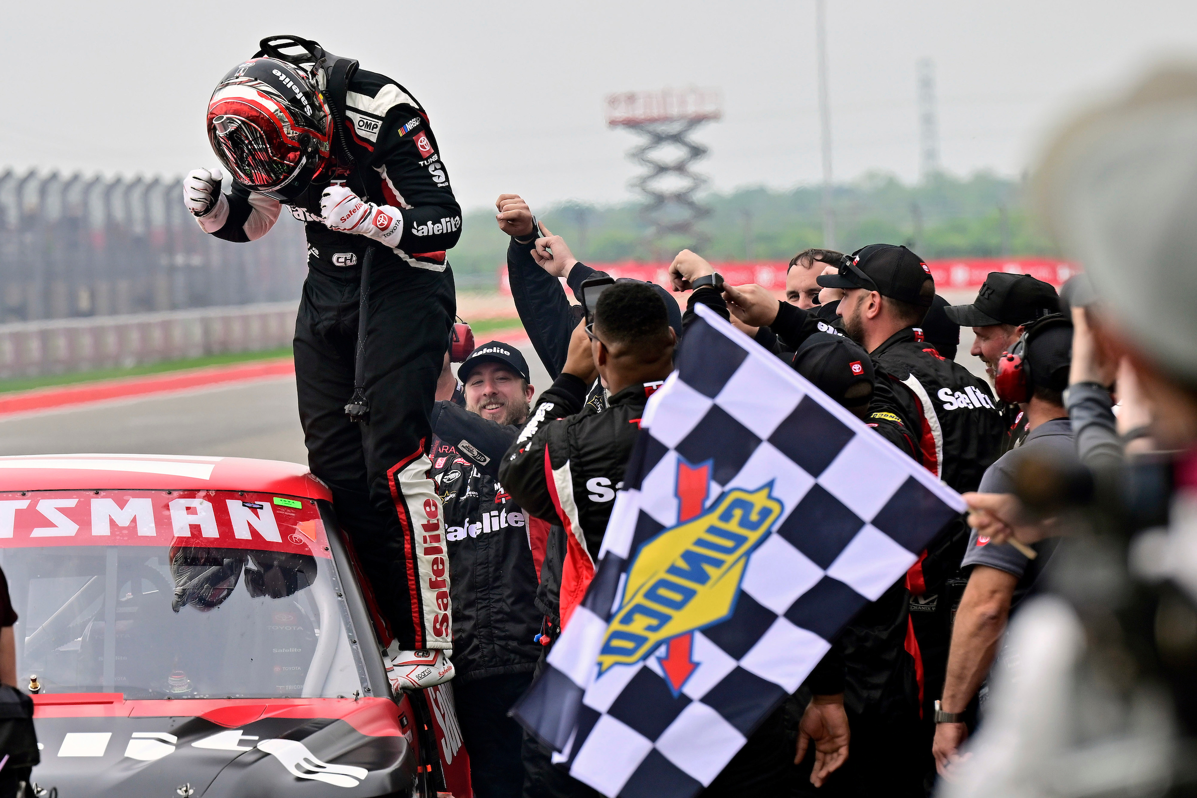 #11: Corey Heim, TRICON Garage, Safelite Toyota Tundra celebrates his win