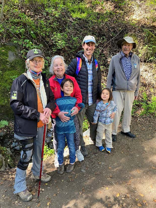 Volunteers pose for a picture on a trail in the Edgewood County Park and Natural Preserve in San Mateo County,California high school students installing cattle exclusion fencing